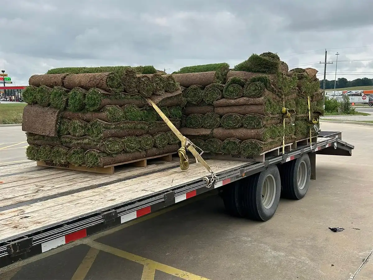 truck delivering a load of sod to a customer